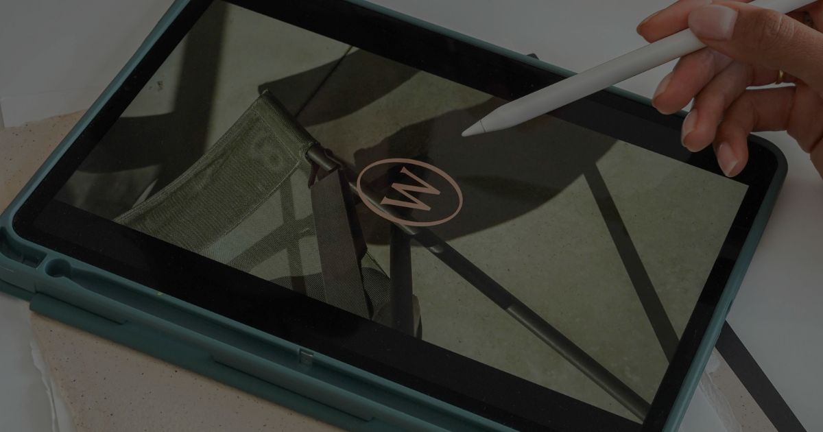 Up After Studios with an image of a woman building a brand from scrach on an ipad with her apple pencil.